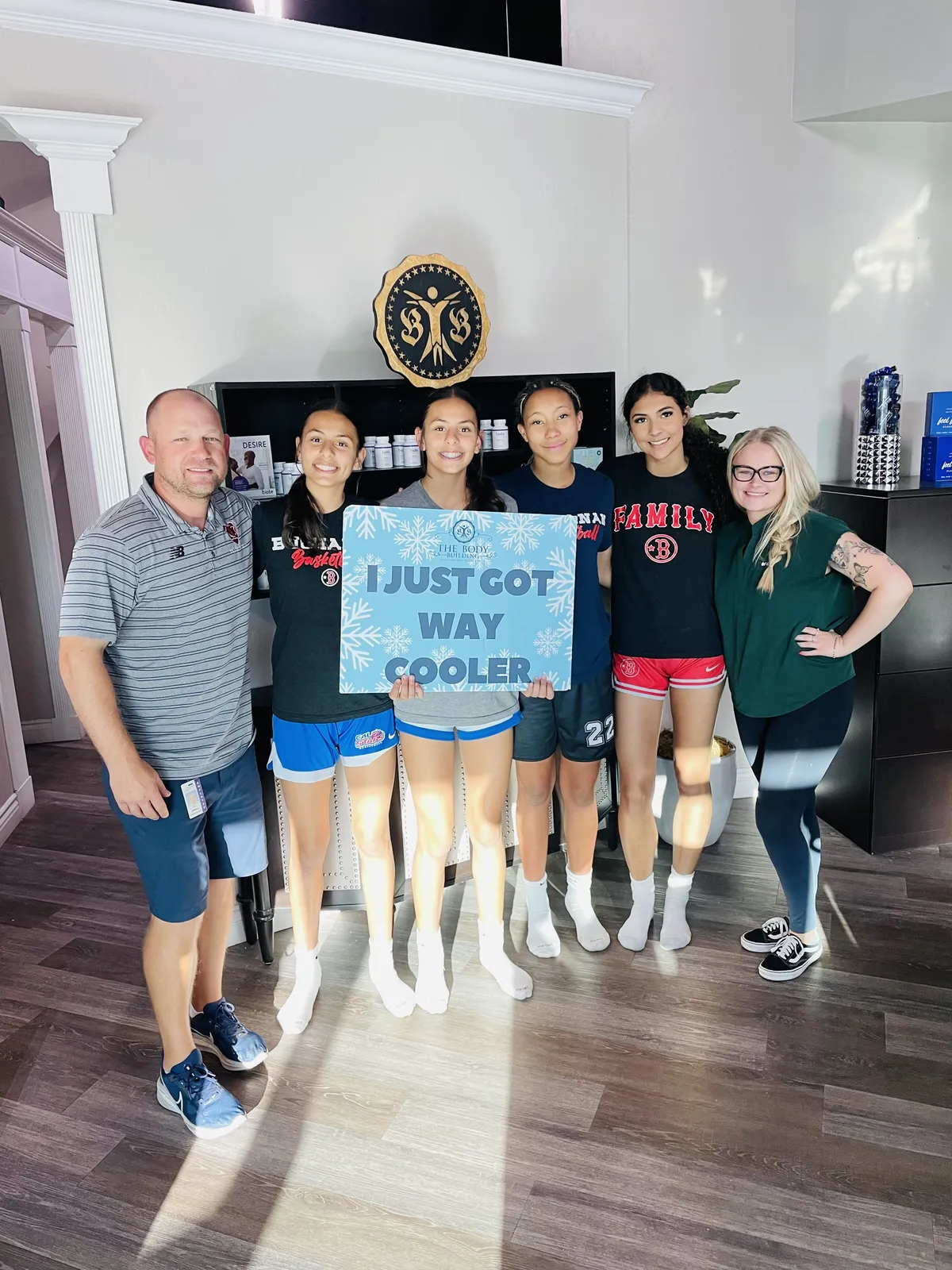 people sitting near table with laptop computer