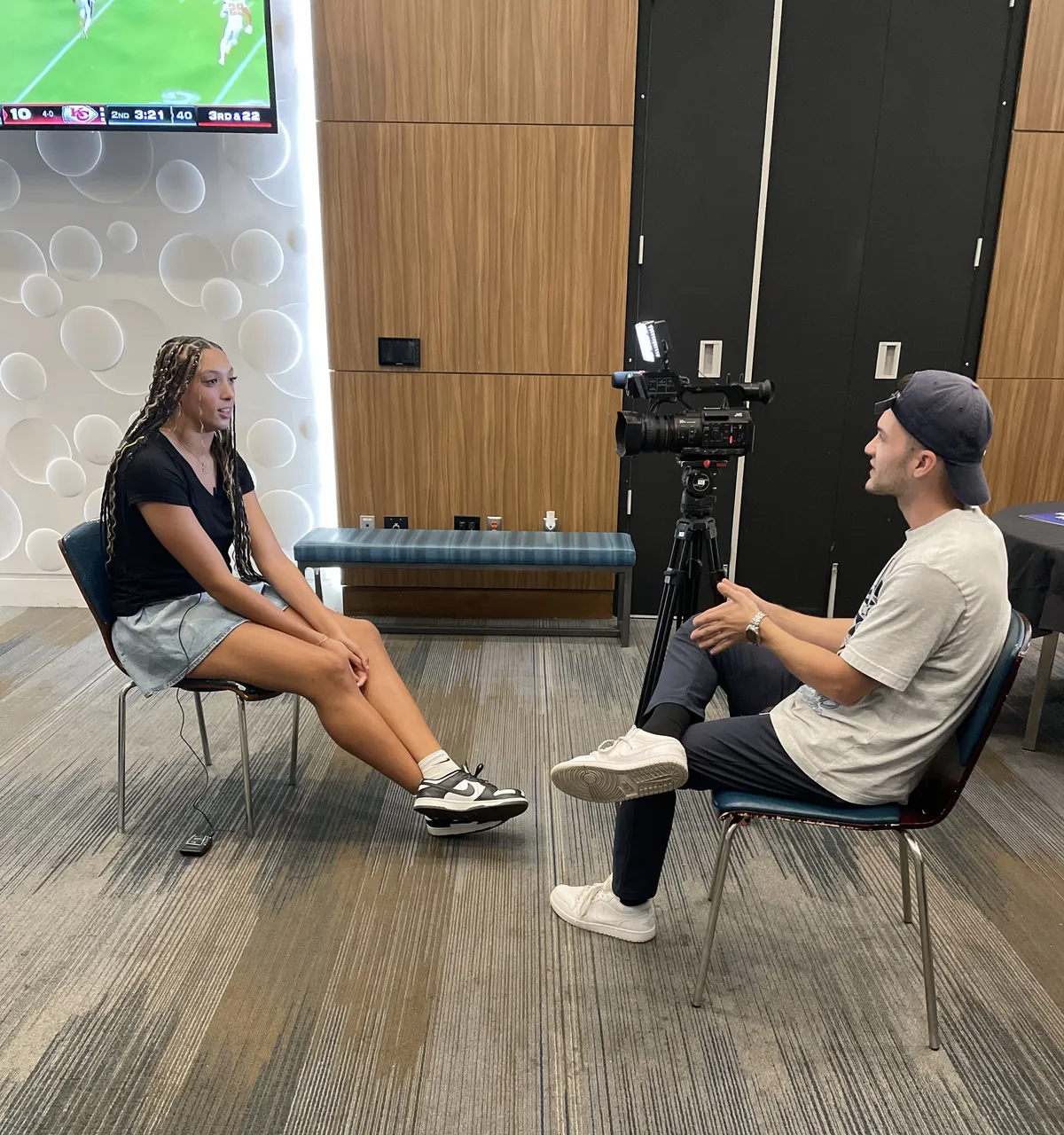 people sitting near table with laptop computer